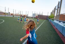Hong Kong Academy students playing football
